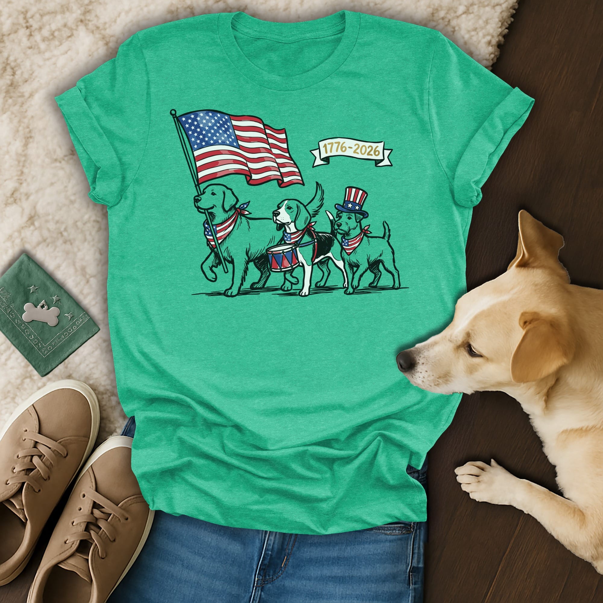 Three dogs in patriotic attire march with a flag and drum, with "1776-2026" text.