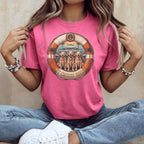 Three golden retrievers in a life preserver circle on a pink cruise shirt.