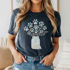 Dark gray t-shirt featuring a floral bouquet of paw prints in a mason jar.