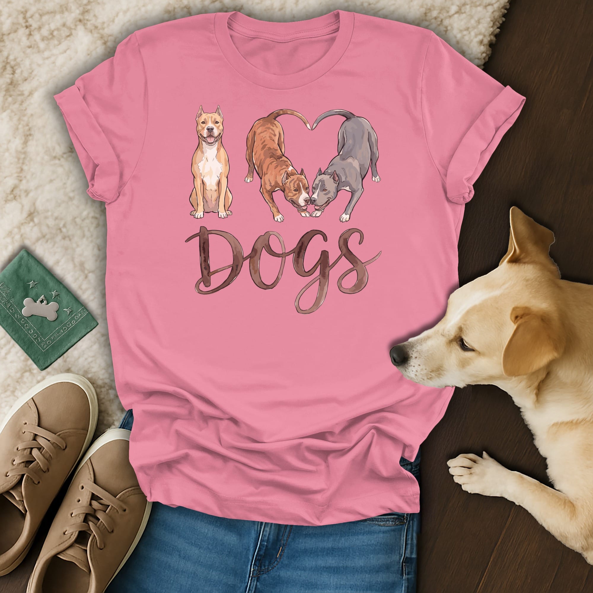 Pink t-shirt with three dogs and the word "Dogs" in watercolor font