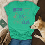 Green t-shirt with "Rescue Dog Club" text and dog illustrations.