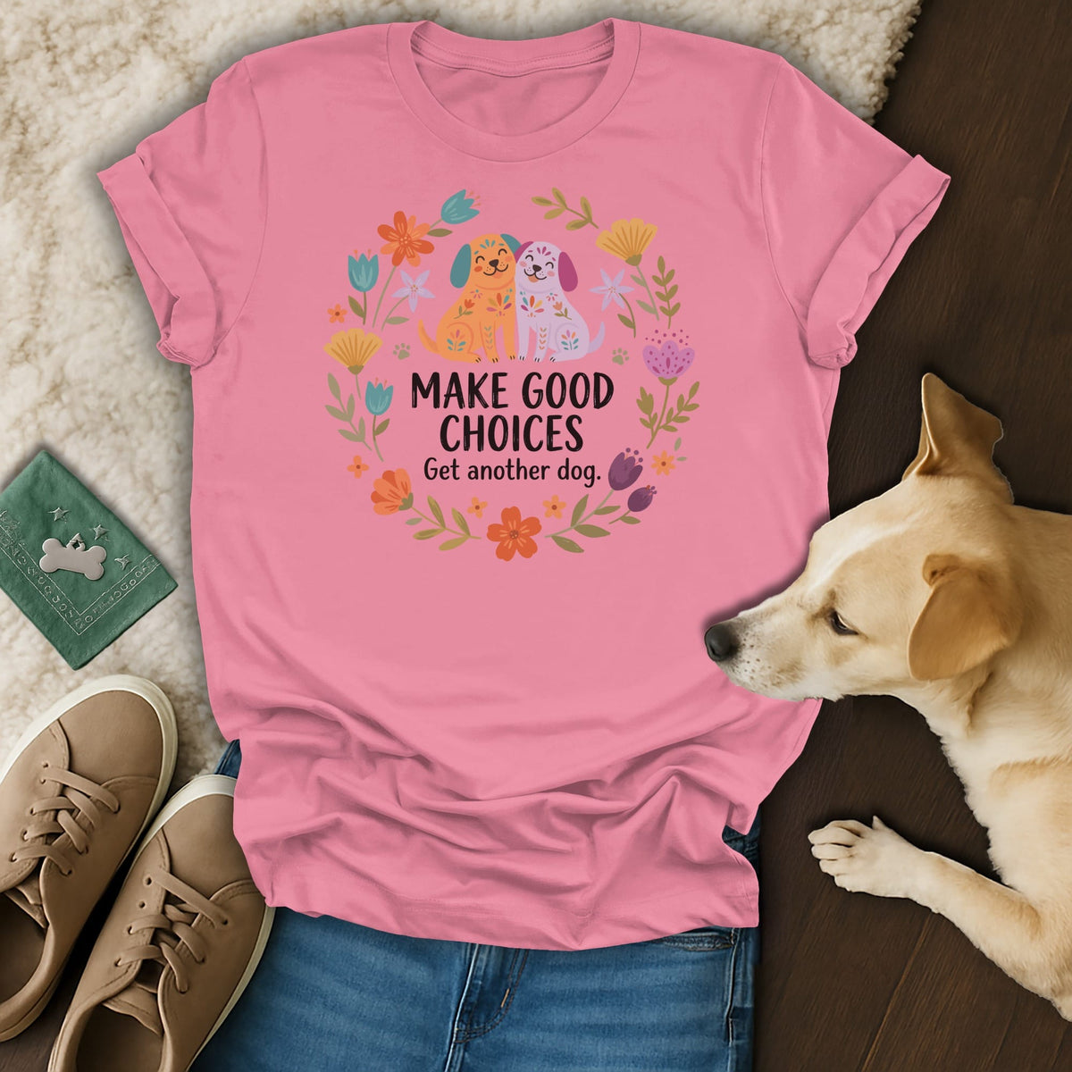 Pink t-shirt with graphic of two dogs and text "MAKE GOOD CHOICES Get another dog."