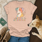 Peach t-shirt with colorful dog graphic and text "Innocent? Never met her."