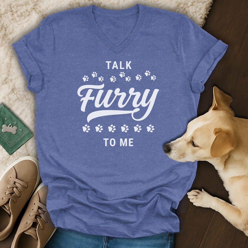 Blue v-neck t-shirt with white text "TALK Furry TO ME" and paw prints.