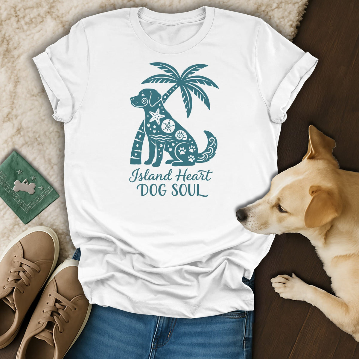 White t-shirt with teal dog, palm tree, and text "Island Heart DOG SOUL".