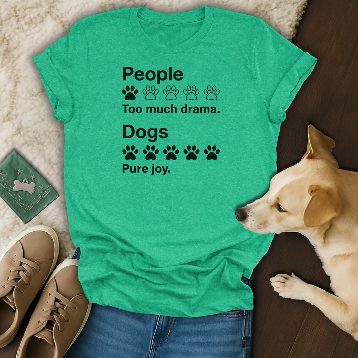 Green t-shirt with text "People Too much drama. Dogs Pure joy." and paw prints.