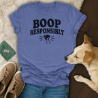 Blue t-shirt with black text "BOOP RESPONSIBLY" and a paw print graphic.
