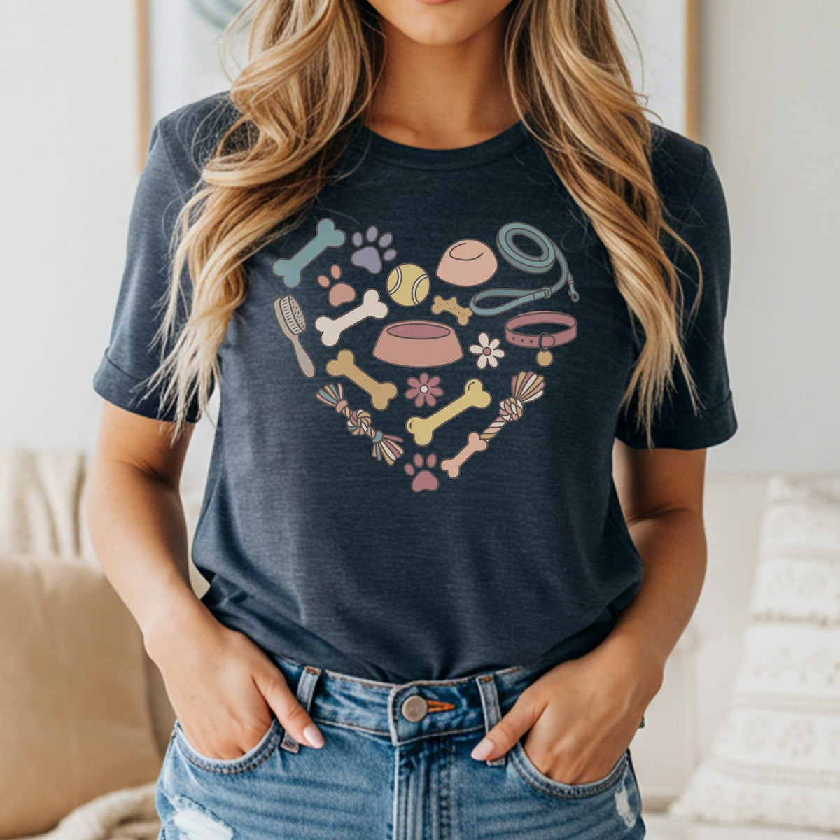 T-shirt with heart-shaped dog accessory pattern including bones, paws, leash, and bowl.