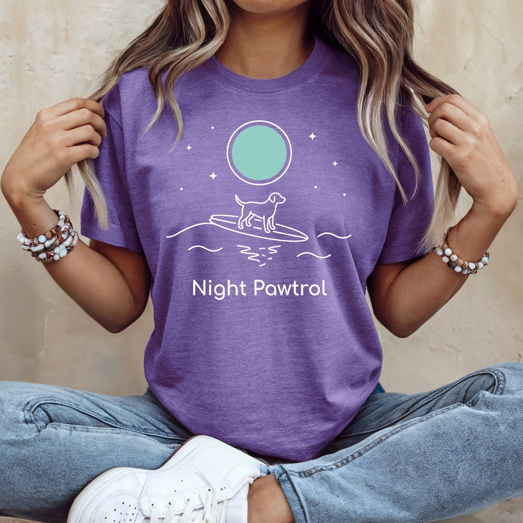 Purple t-shirt with "Night Patrol" text, dog on surfboard under moon.