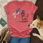 Dog wearing a top hat with an American flag on a t-shirt.