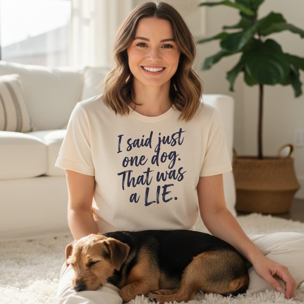 Cream t-shirt with dark blue text "I said just one dog. That was a LIE." and a dog.