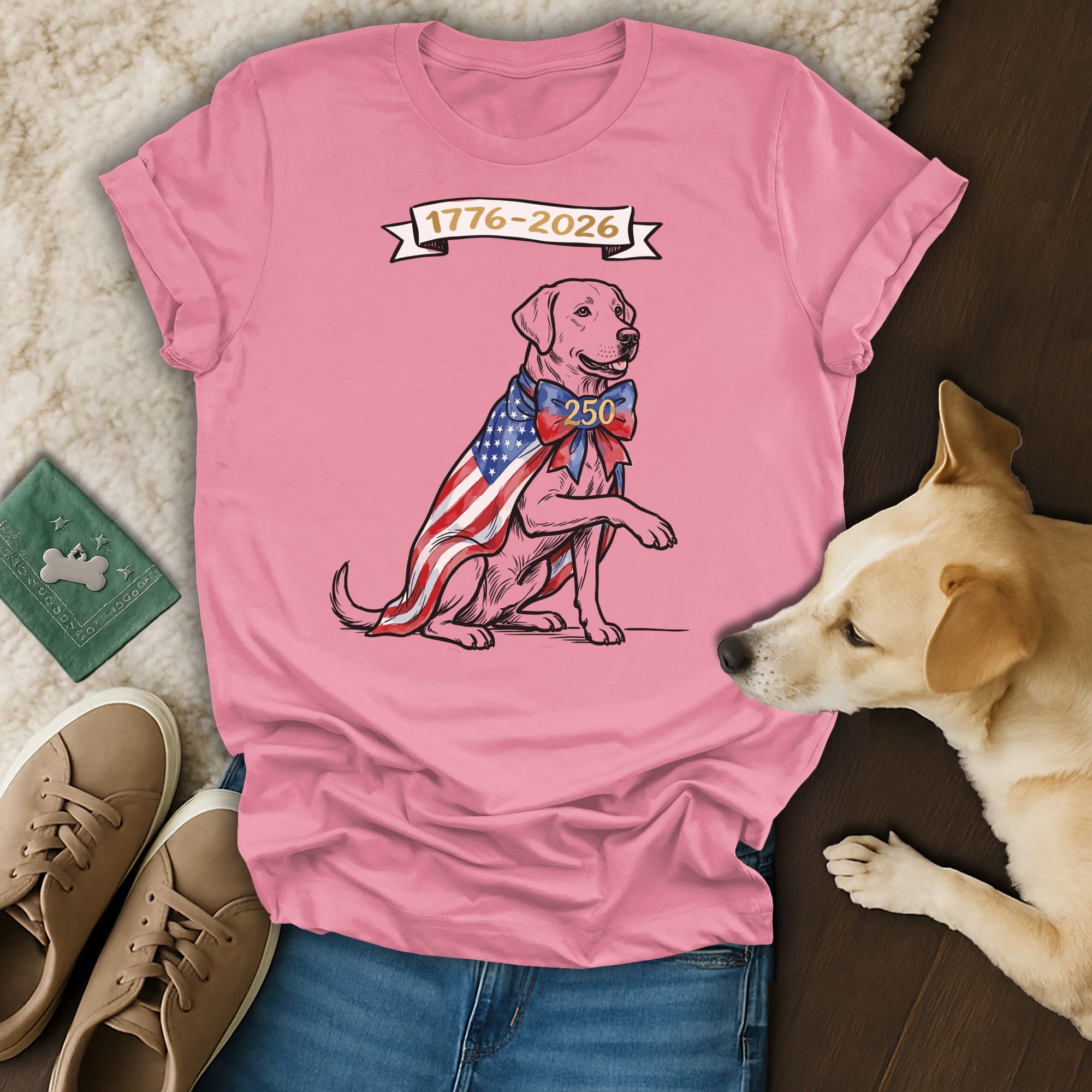 Pink t-shirt with a patriotic dog graphic, "1776-2026 250" banner, and a real dog.