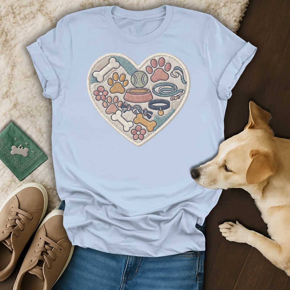 Light blue t-shirt with embroidered heart of dog toys and accessories.