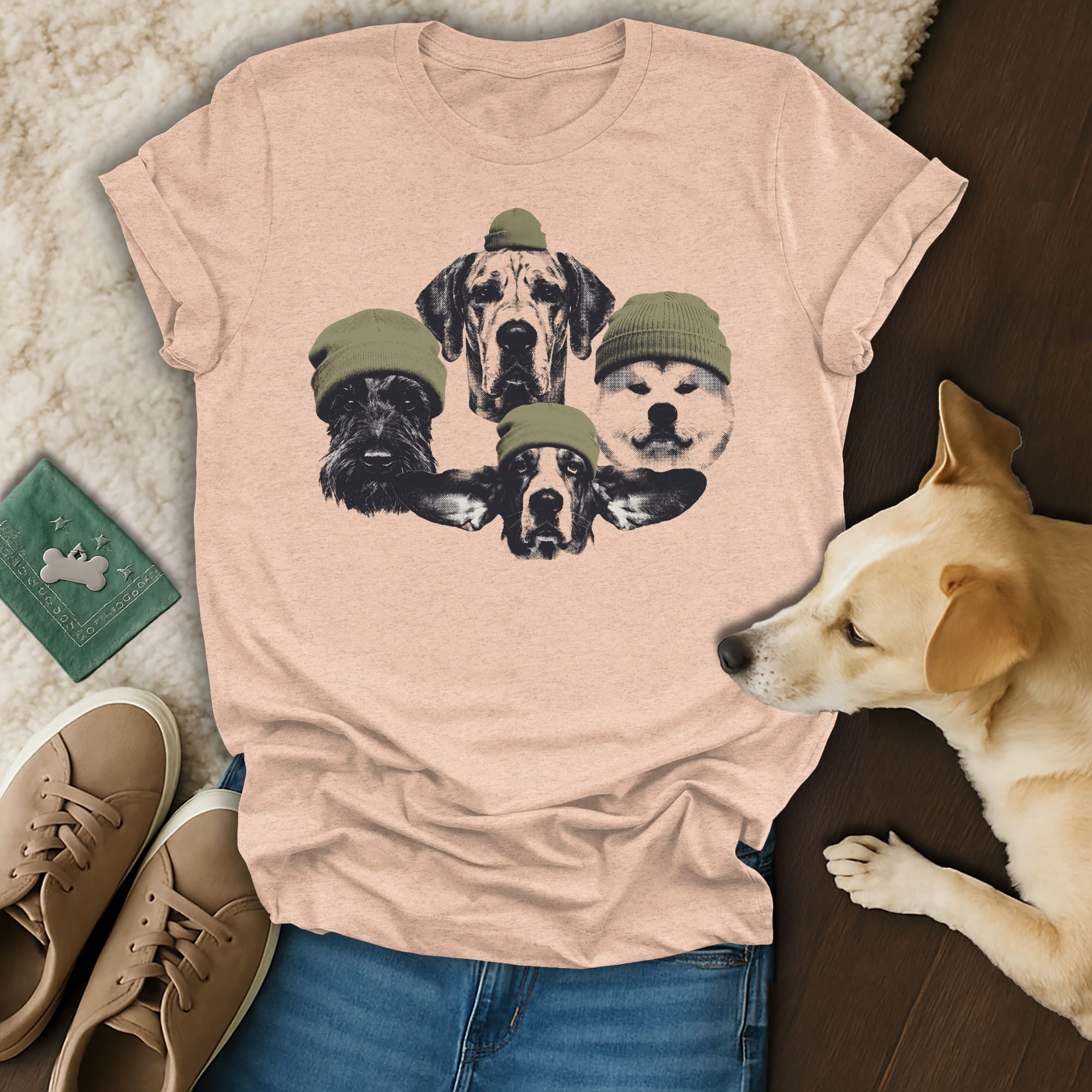 Graphic t-shirt with four dog faces wearing knit beanies.