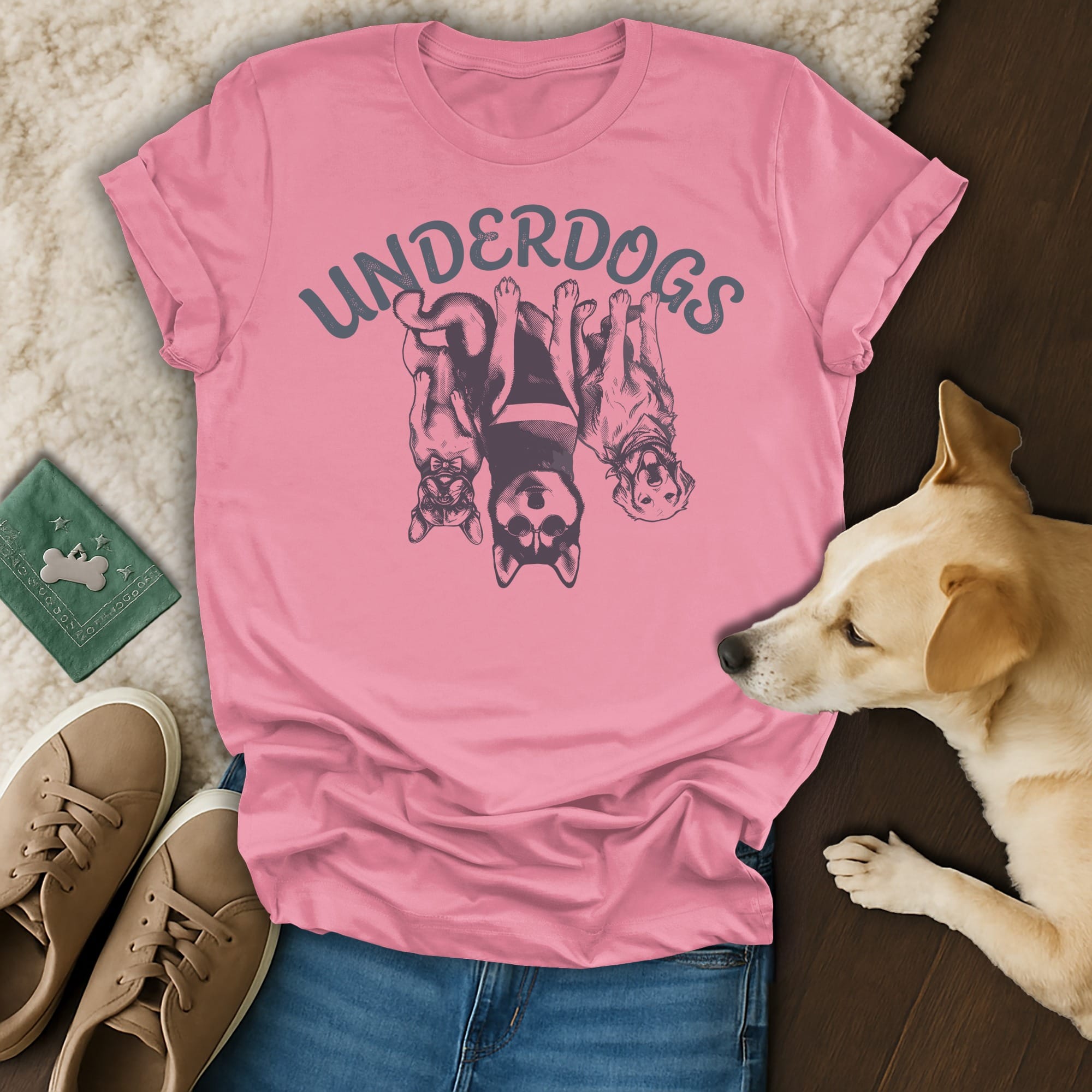 Pink t-shirt with "UNDERDOGS" text and three dogs.