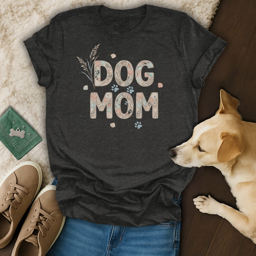 Dark grey t-shirt with "DOG MOM" text in seashell and paw print graphics.