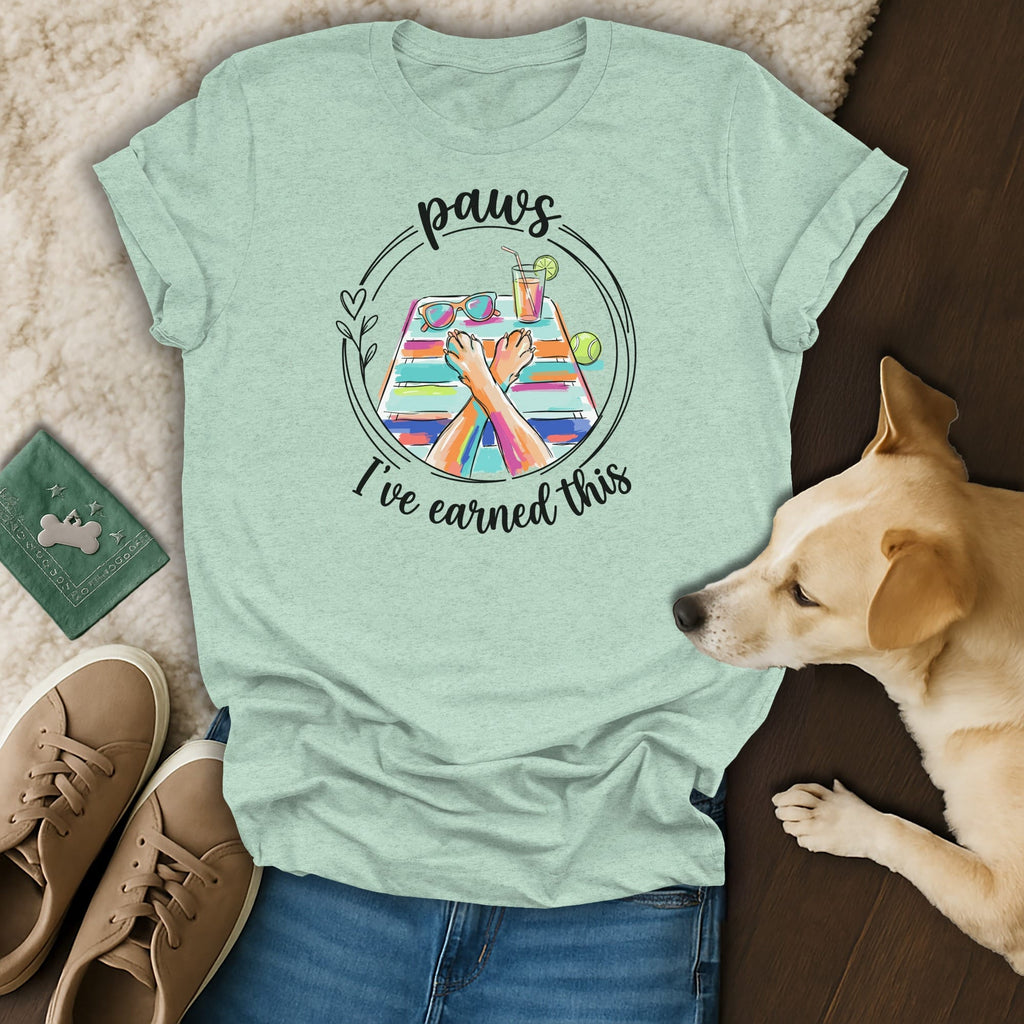 Light blue t-shirt with "paws I've earned this" text and paw illustration.