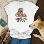 White t-shirt with a pug in a hoodie and pumpkins, text "SNUG AS A PUG".