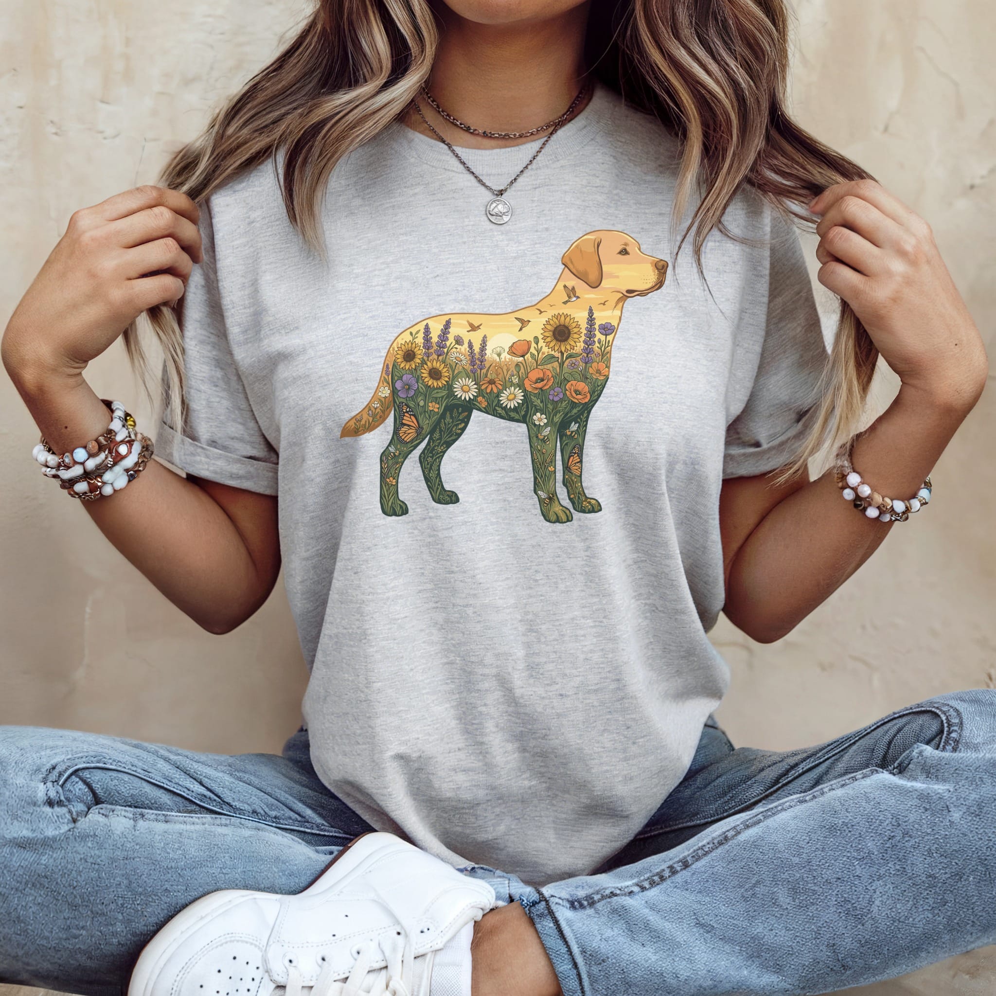 Labrador retriever silhouette filled with sunflowers, butterflies, and flowers.