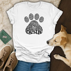 White t-shirt with black paw print graphic saying "Bestie" repeatedly.
