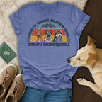 T-shirt with three dogs and text "Guarded the Pharaohs. Sailed with Vikings. Currently chasing squirrels."