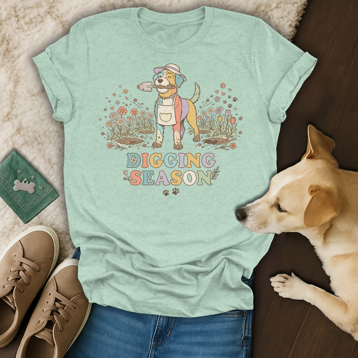 T-shirt with a cartoon dog in a garden with text "DIGGING SEASON".