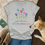 Gray t-shirt with colorful paw prints and butterfly, text "Where the wild paws grow."