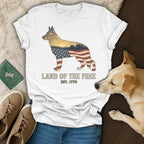 White t-shirt with German Shepherd silhouette, flag, and "LAND OF THE FREE" text.