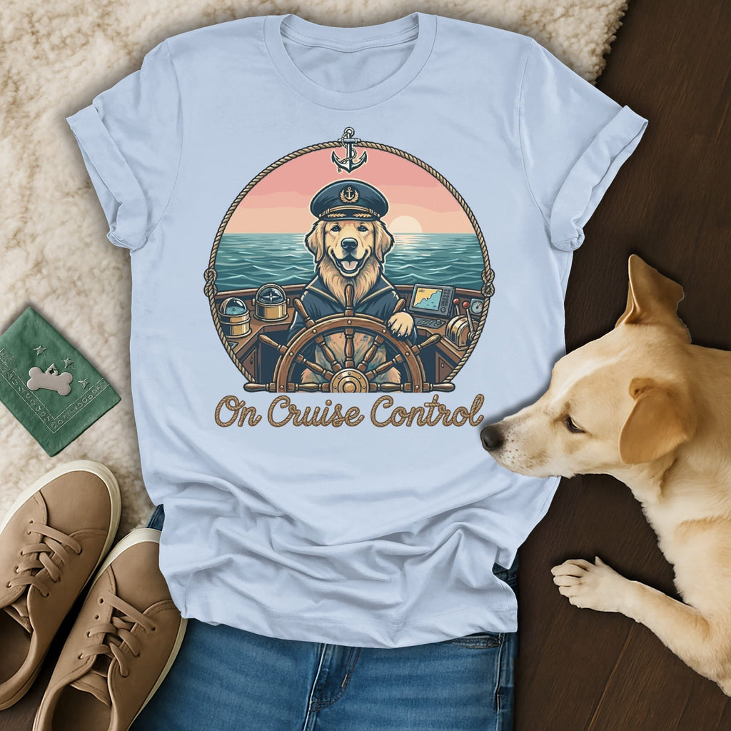 Golden retriever captain in circle graphic on light blue t-shirt with "On Cruise Control" text.