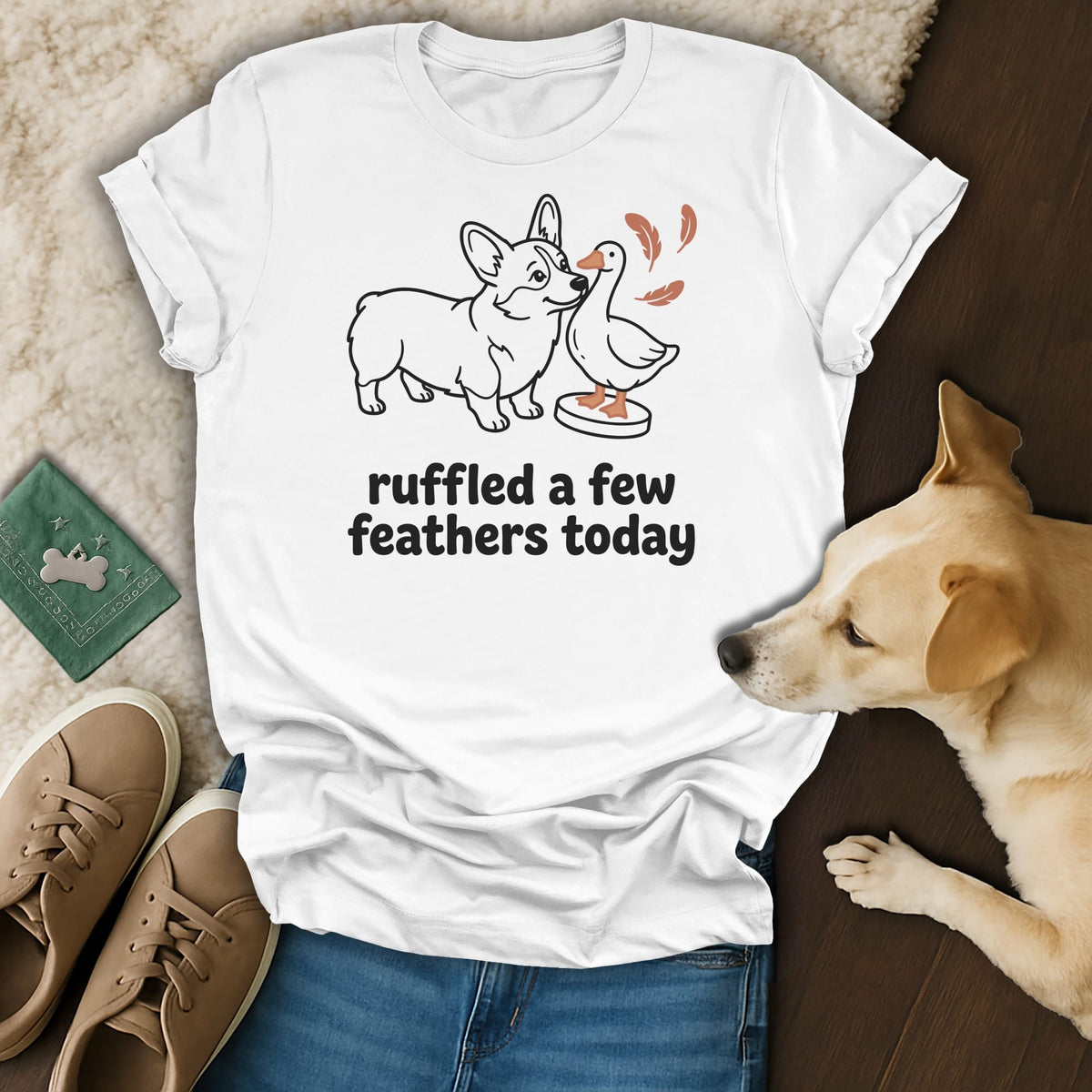White t-shirt with a corgi and duck graphic and text "ruffled a few feathers today."