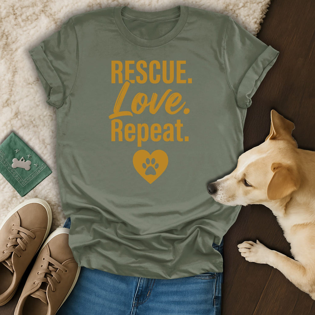 Green t-shirt with "RESCUE. Love. Repeat." and a paw print heart.