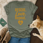 Green t-shirt with "RESCUE. Love. Repeat." and a paw print heart.