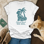 White t-shirt with a teal graphic of a dog and palm tree, text "Island Heart DOG SOUL".
