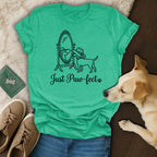 Dog wearing hat looking in mirror with "Just Paw-fect" text.
