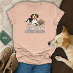 T-shirt with cartoon dog and text "Currently Between Projects".