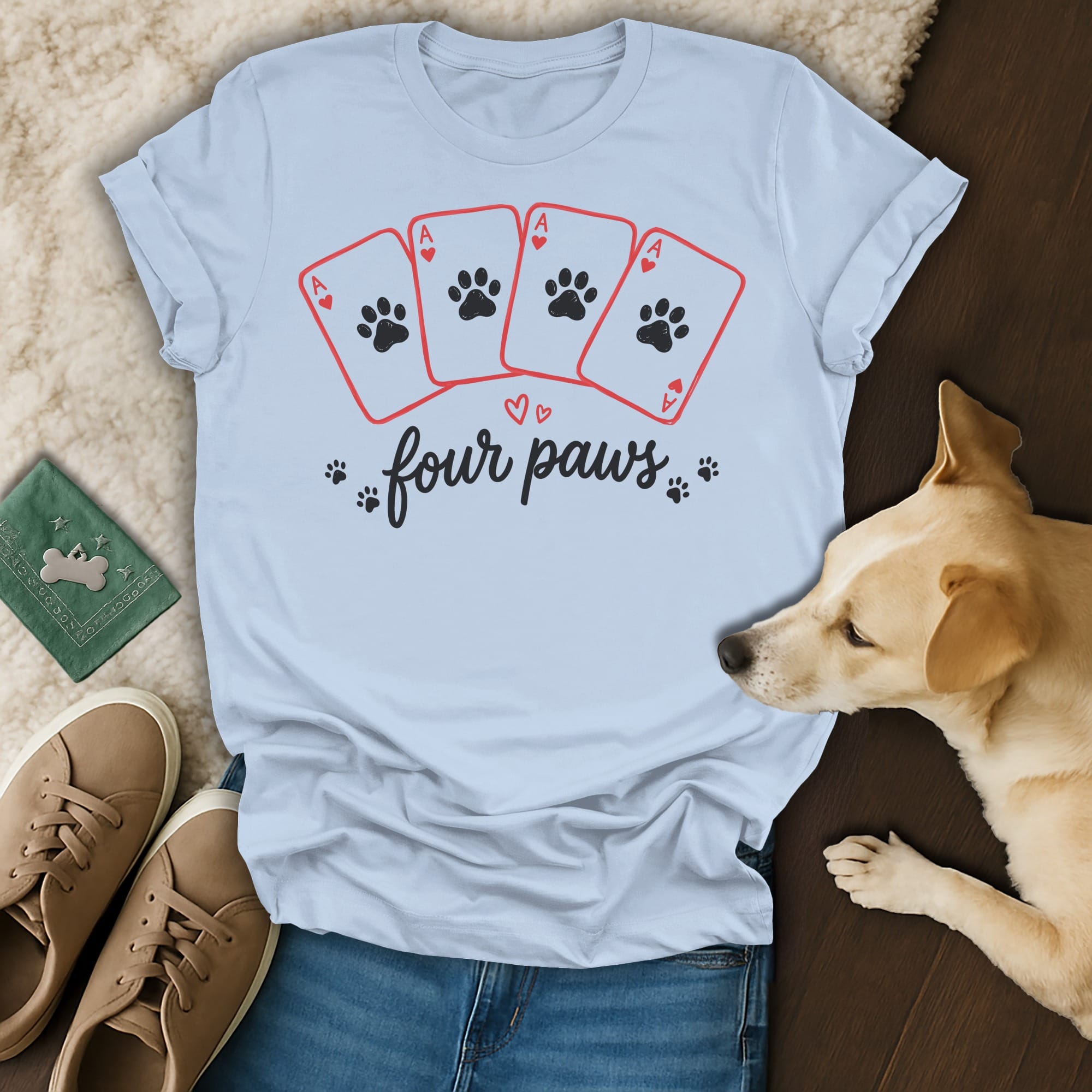 Light blue t-shirt with four ace cards featuring paw prints and "four paws" text.