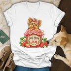 A white v-neck t-shirt featuring a graphic of a Yorkshire terrier inside a strawberry jam jar with the text Dog Mom Is My Jam.