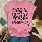 Pink t-shirt with "Dog is my love language" text and dog paw print.