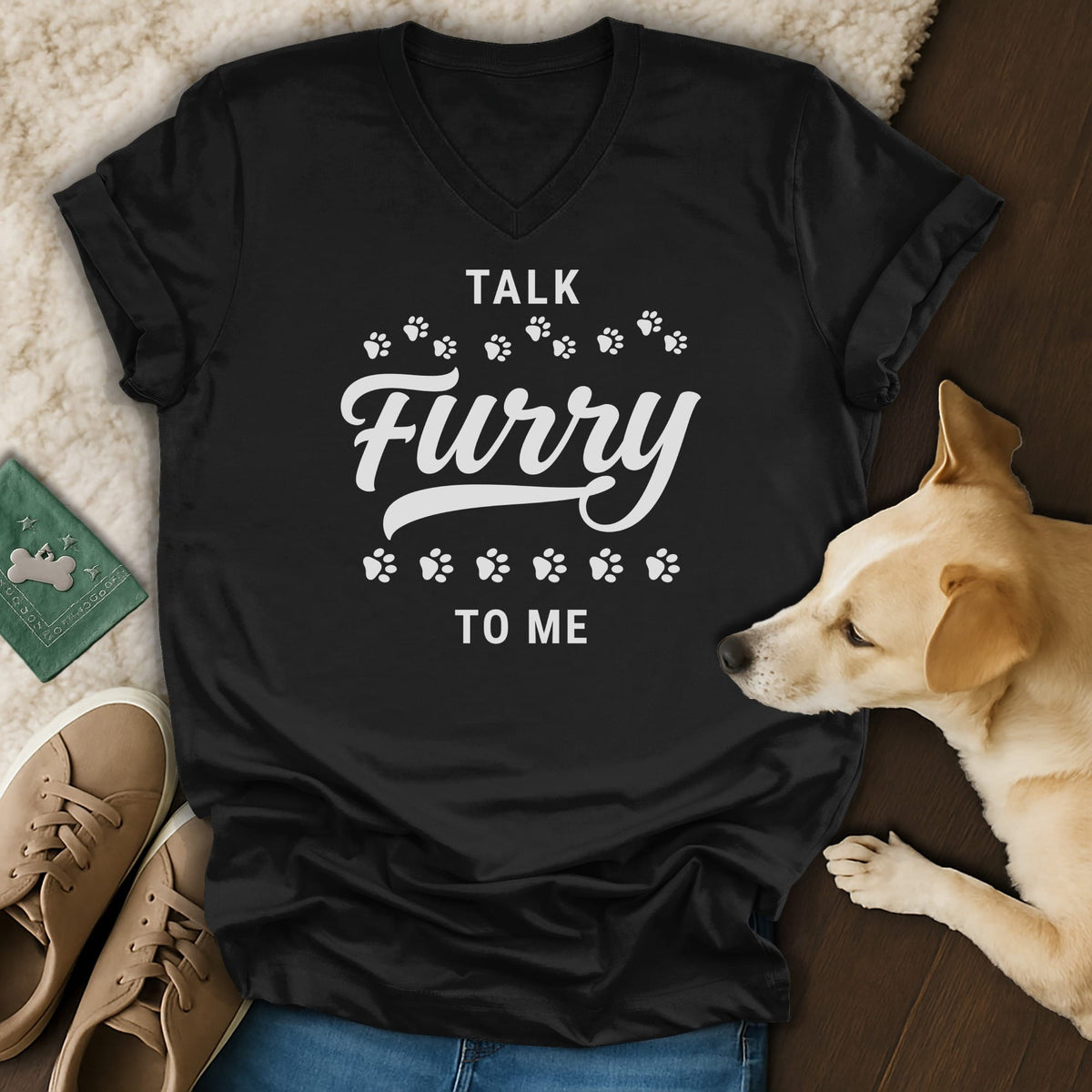 Black t-shirt with white text "TALK FURRY TO ME" and paw prints.