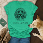 Green t-shirt with black doodle dog art and "Emotional Support Curls" text.