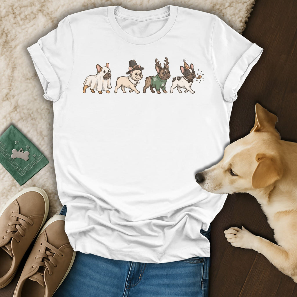 White t-shirt featuring four French Bulldogs dressed in costumes: ghost, pilgrim, reindeer, and party.