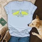 Light blue t-shirt with a tennis scene featuring a dog and "40 - Love" text.