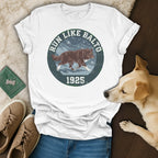 White t-shirt with "Run Like Balto 1925" text and husky image.
