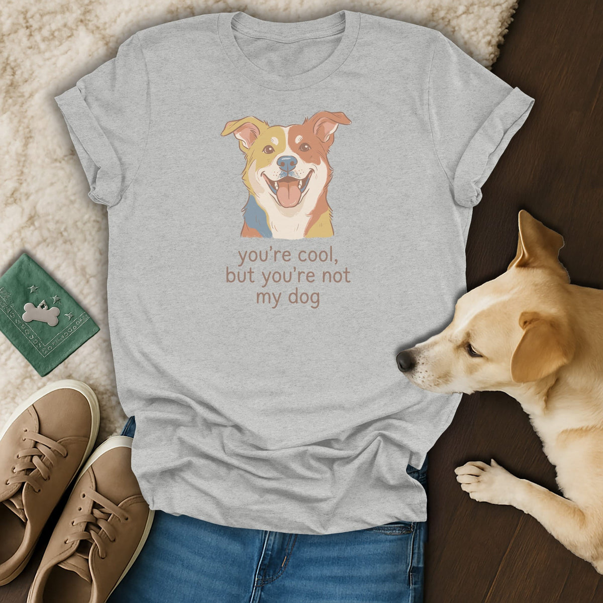 Grey t-shirt with a cartoon dog and text: "you're cool, but you're not my dog."