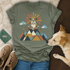 Bulldog meditating on mountain top with sun and clouds design.