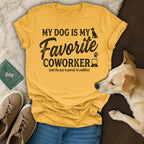 Yellow t-shirt with "My dog is my favorite coworker" and paw print graphic.