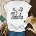 White t-shirt with a Great Dane pulling a small person on a leash.