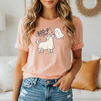 Peach t-shirt with graphic of dog in ghost costume and text "BOO-P".