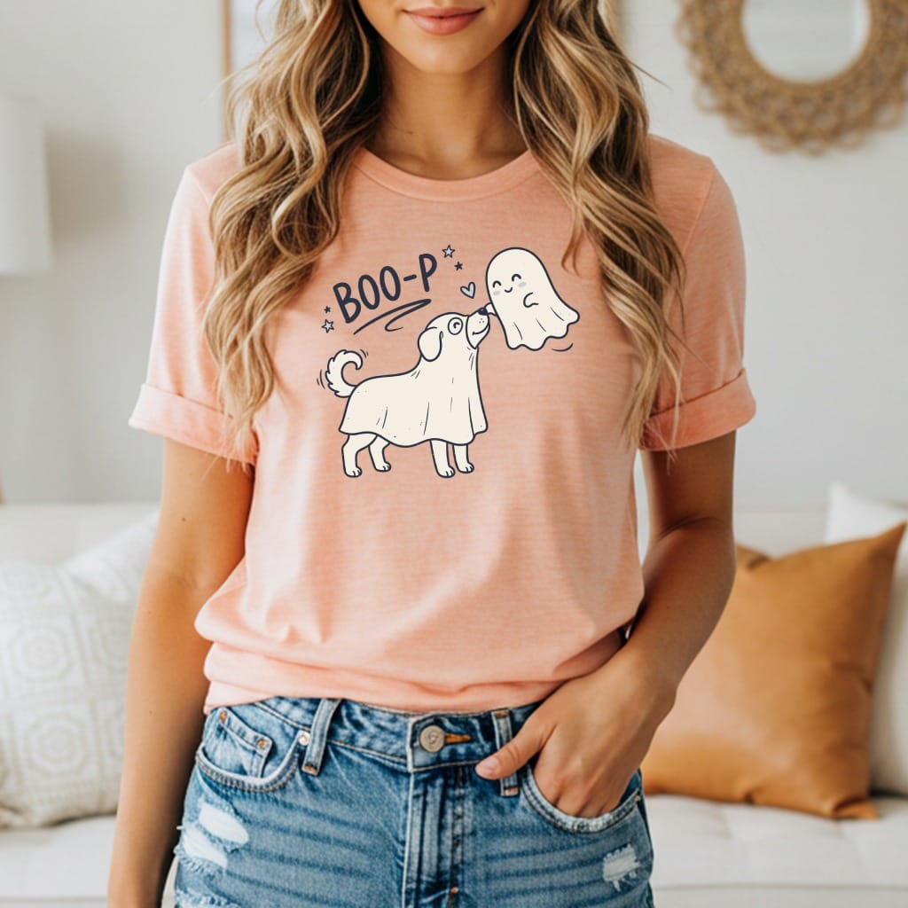 Peach t-shirt with graphic of dog in ghost costume and text "BOO-P".