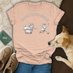 T-shirt with "HERE FOR THE FUR-NANIGANS" text and drawing of a corgi in a cart chasing a mail carrier.